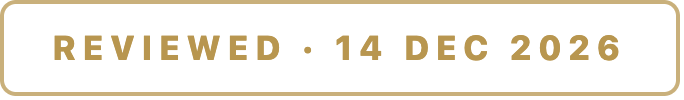 A gold stamp reading &ldquo;Reviewed · 14 Dec 2026&rdquo;